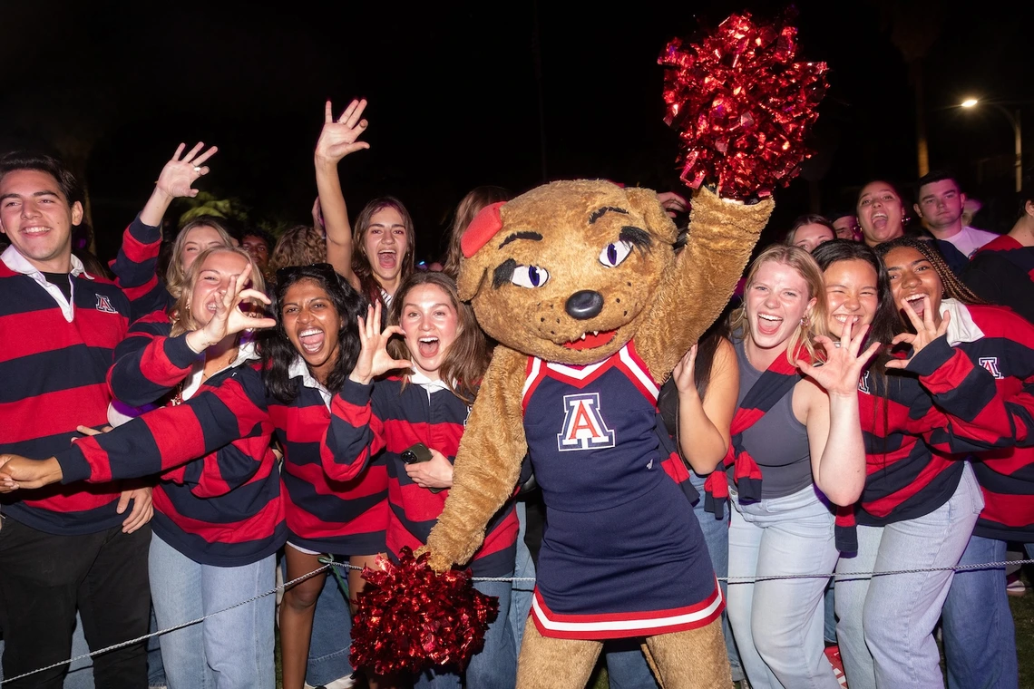 Wilma Wildcat with University of Arizona students; university source photograph